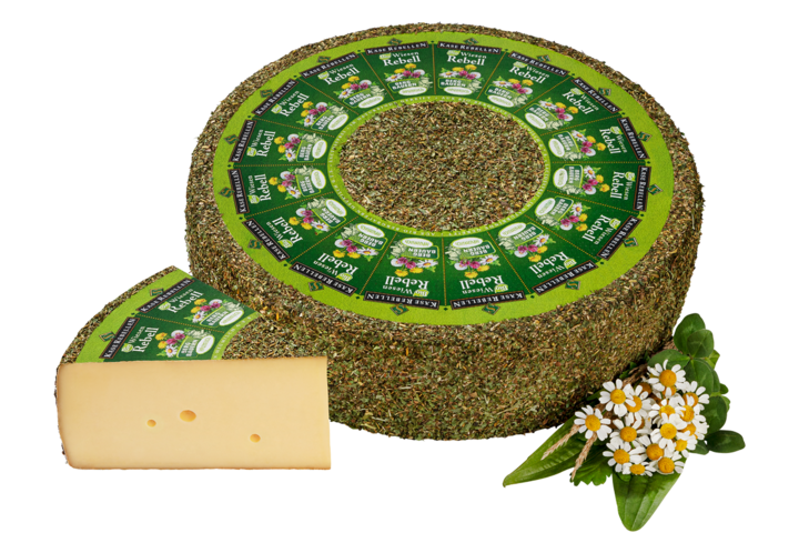 Bio Schnittkäse mit Wiesenkräutern umhüllt