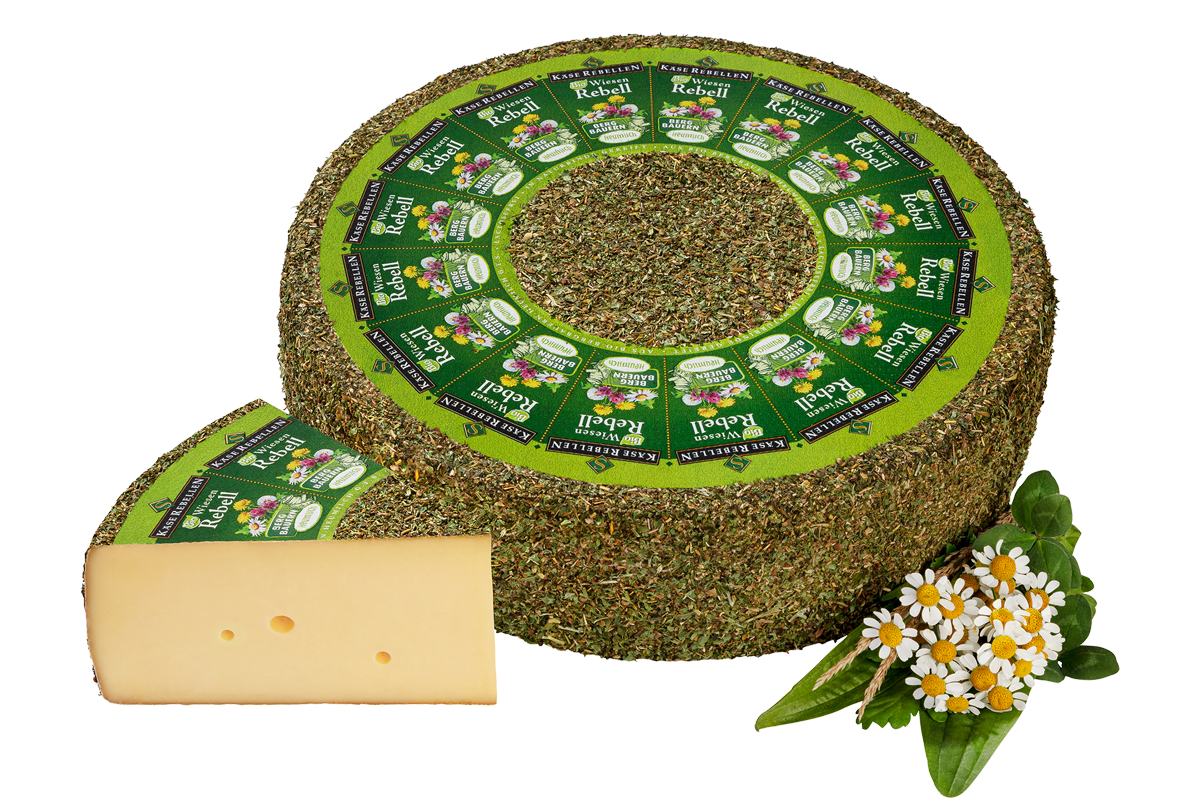 Bio Schnittkäse mit Wiesenkräutern umhüllt